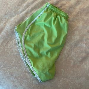Green Nike running shorts
